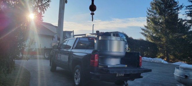Delivery of commercial kitchen fan for golf course by Elite Hood Cleaning Wisconsin equipment