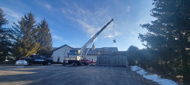 Golf course restaurant exhaust fan installation with crane Elite Hood Cleaning Wisconsin
